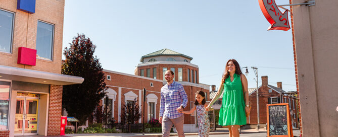 Family walking down a Harrisonburg street