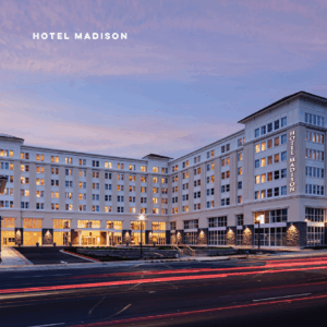 Hotel Madison Conference Center from across the street at sunset.
