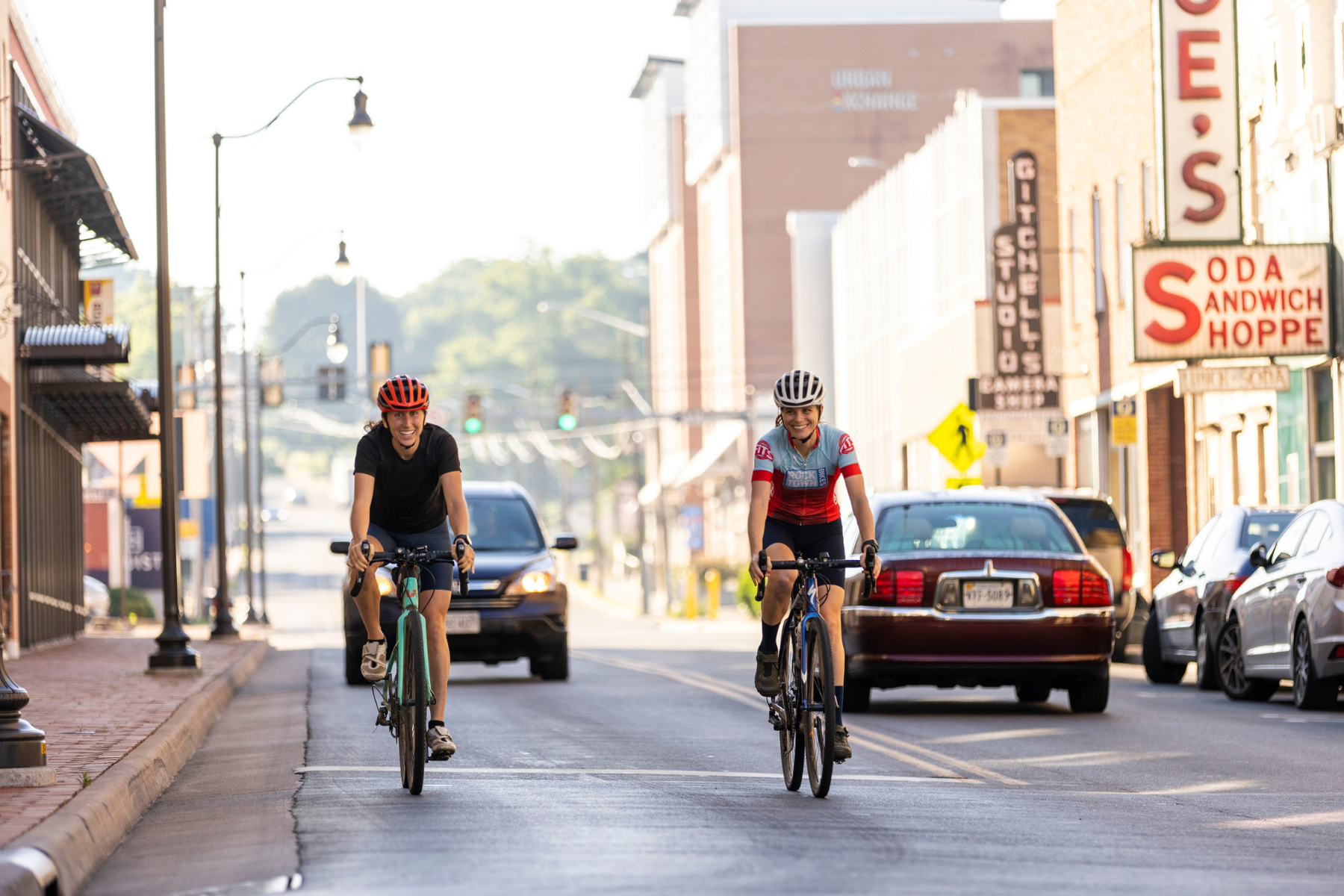 Two bikers on main street in Harrisonburg