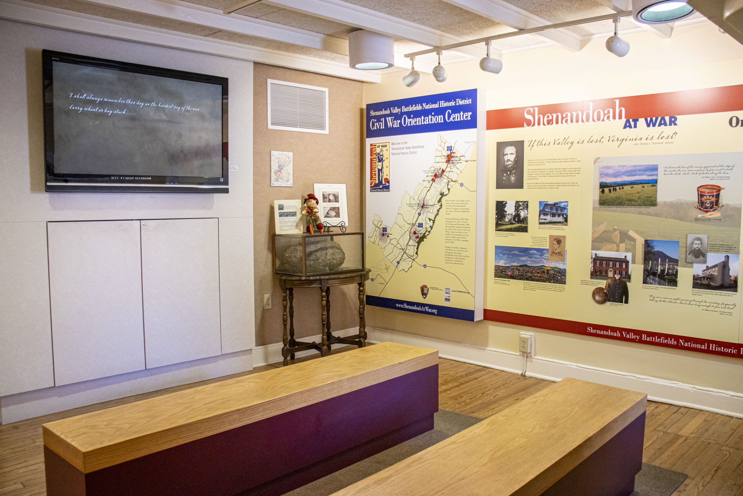 Civil War Orientation Center 3 Inside the Civil War Orientation Center with displays, benches, and television