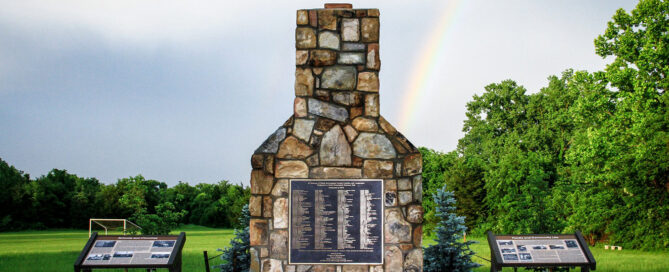 Blue Ridge Heritage Project Monument with a rainbow in the background