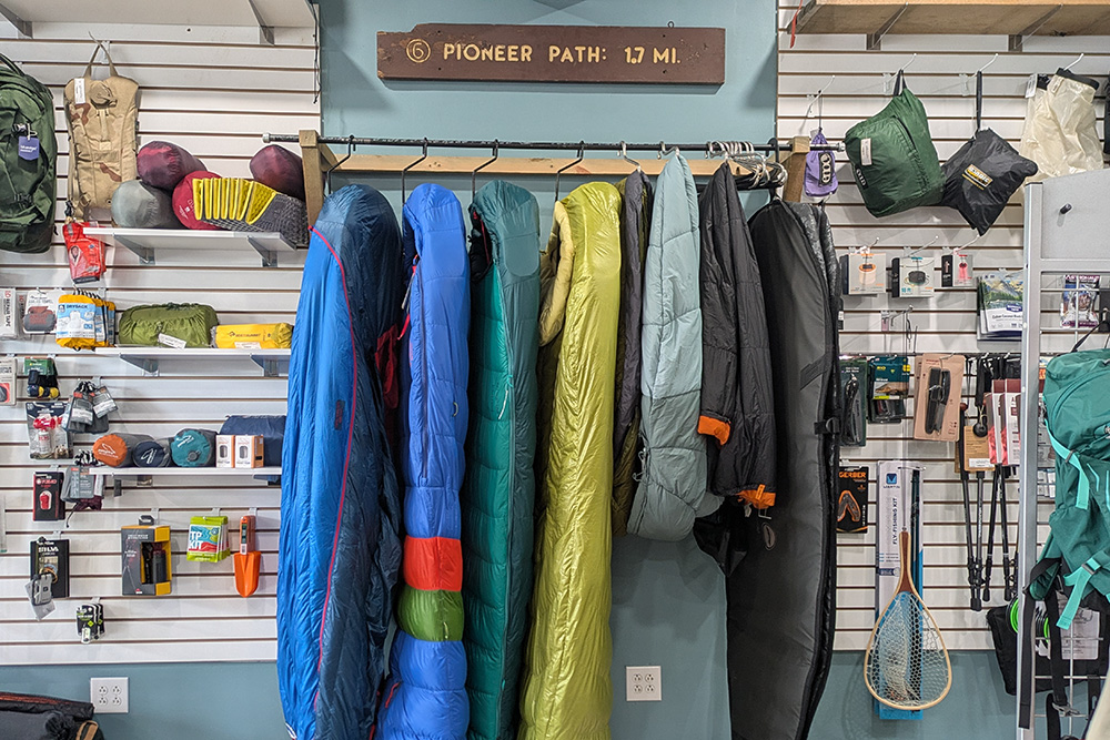 Sleeping bags hanging in store