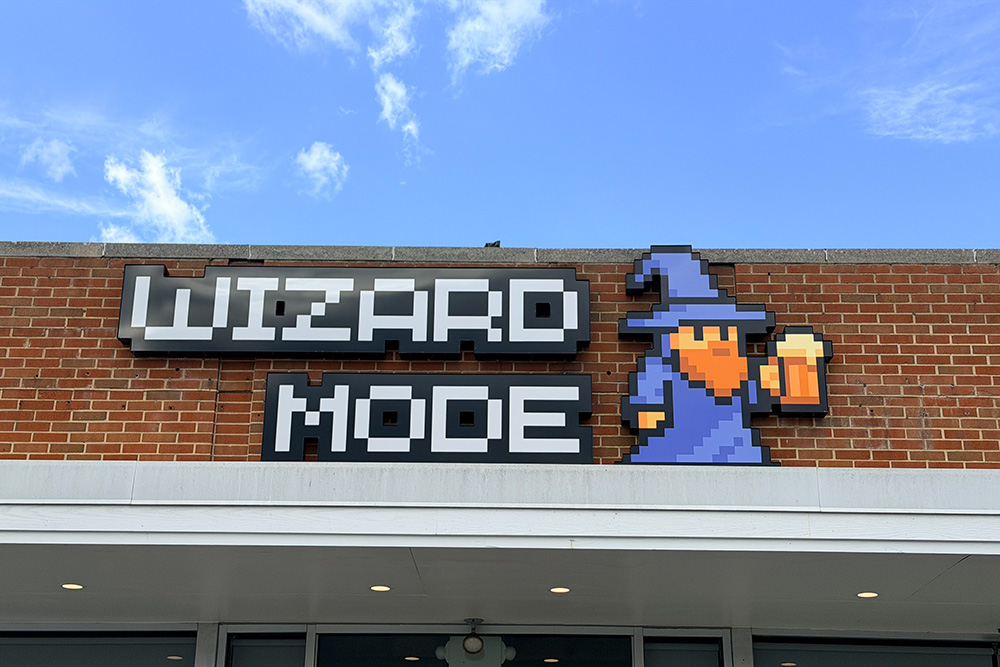 Wizard Mode sign on building
