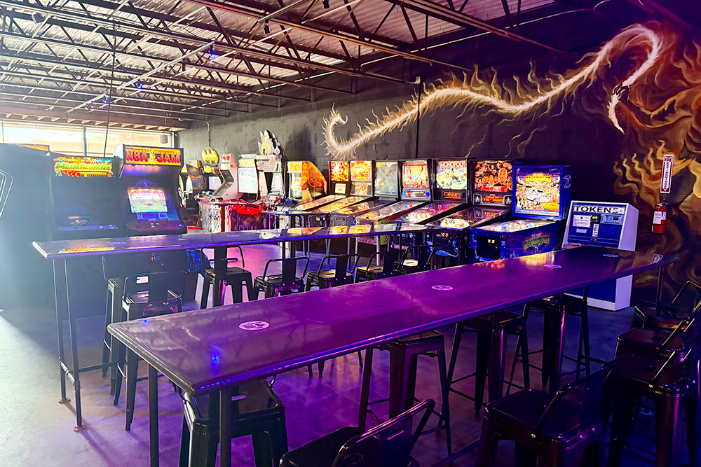 Long table, pinball machines, and other arcade games